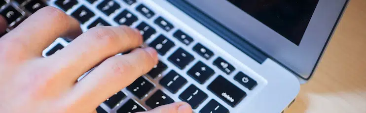 laptop-hand-header