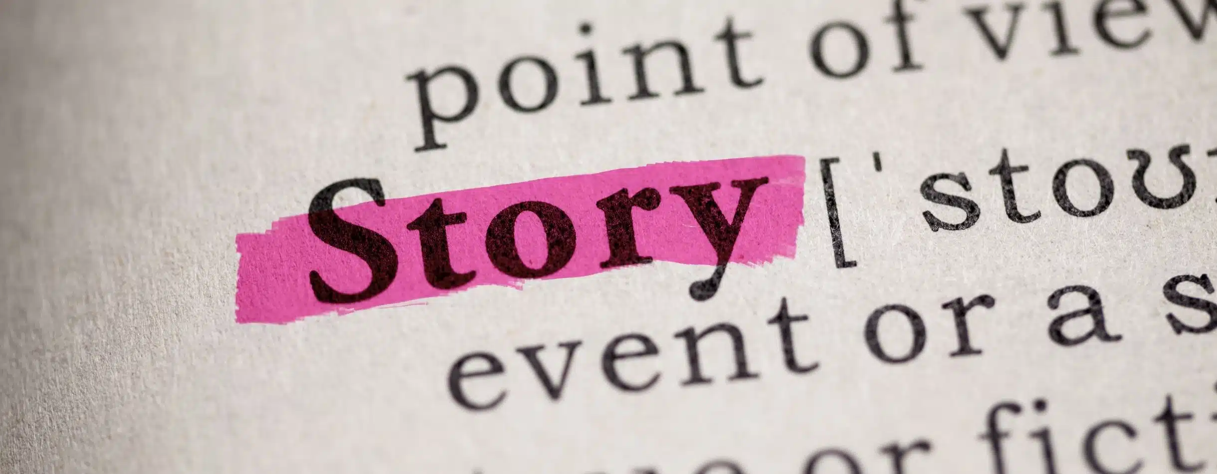 A dictionary lays out with the word Story highlighted in purple. It's used to emphasize the word Story alone rather than a full definition.
