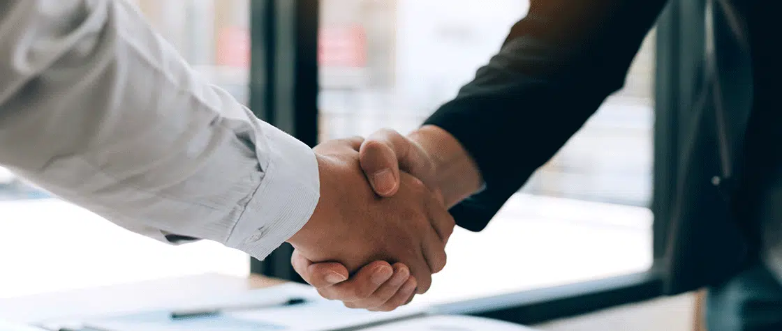 two people shaking hands