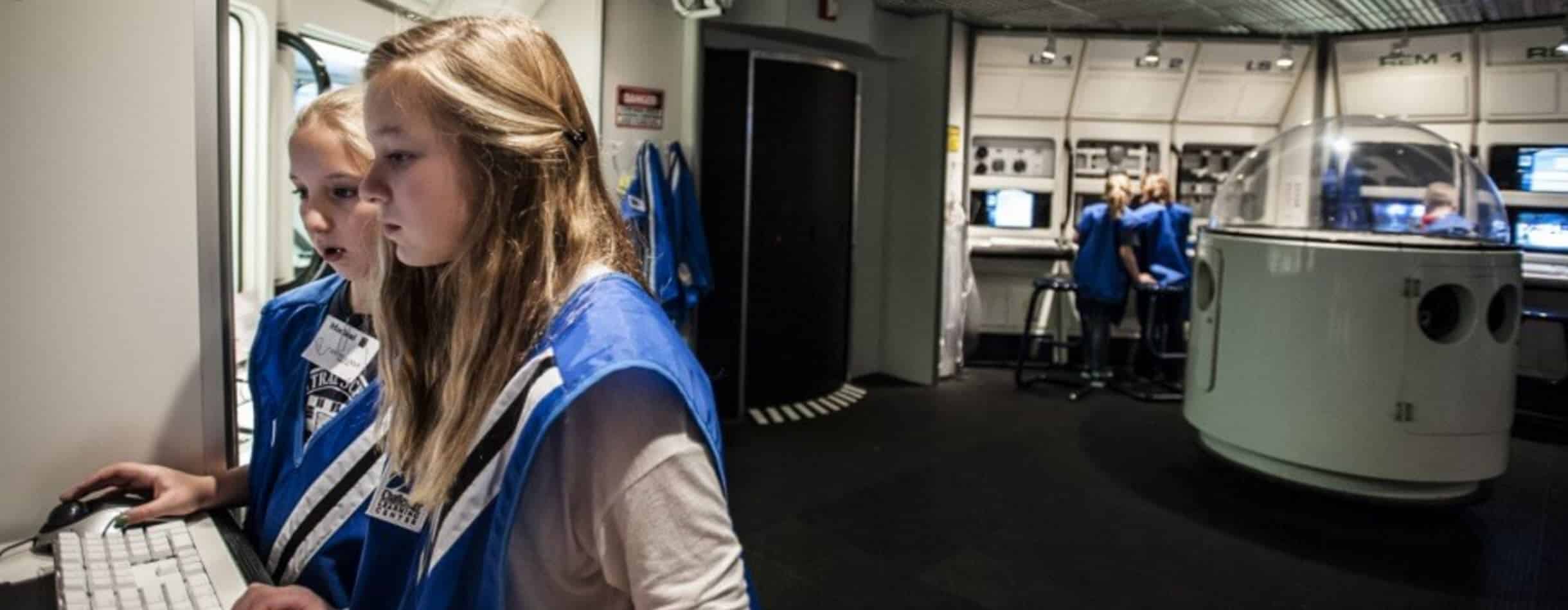 image of two youths at the Challenger Learning Center