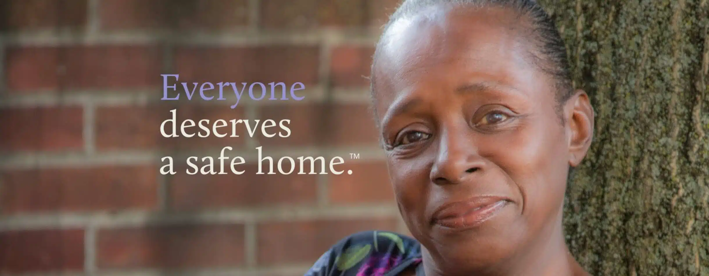 image of a woman with the words everyone deserves a safe home