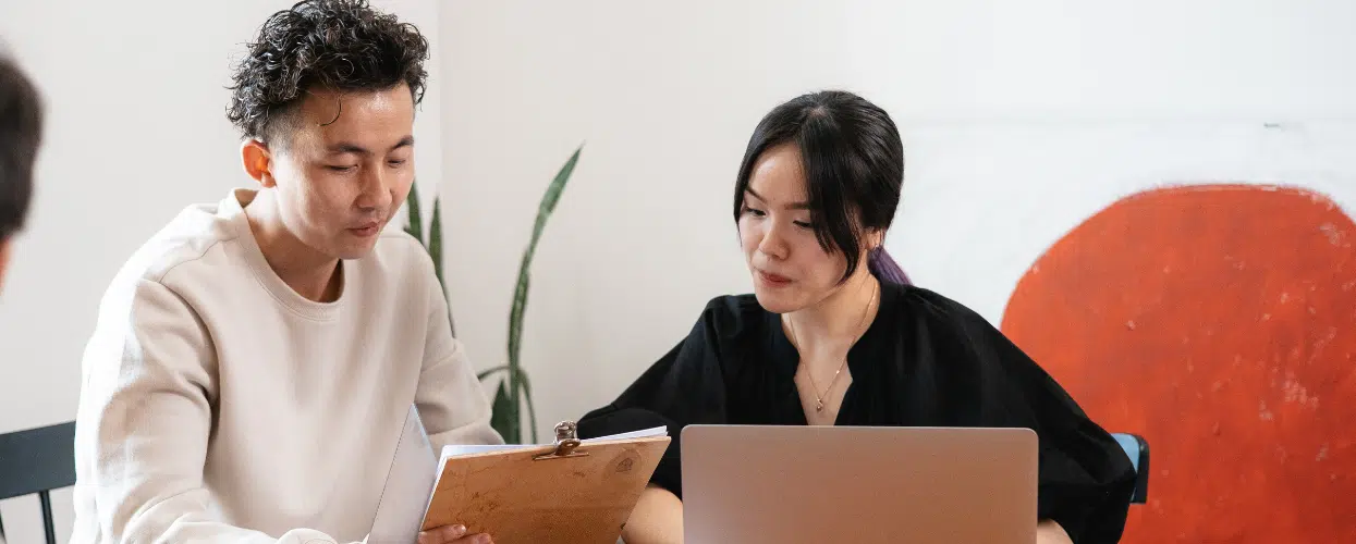 photo of people sitting at computers