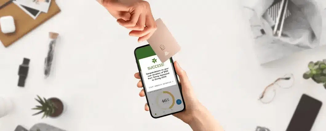 Bloomerang’s Tap-to-Pay feature is shown processing a mobile donation.